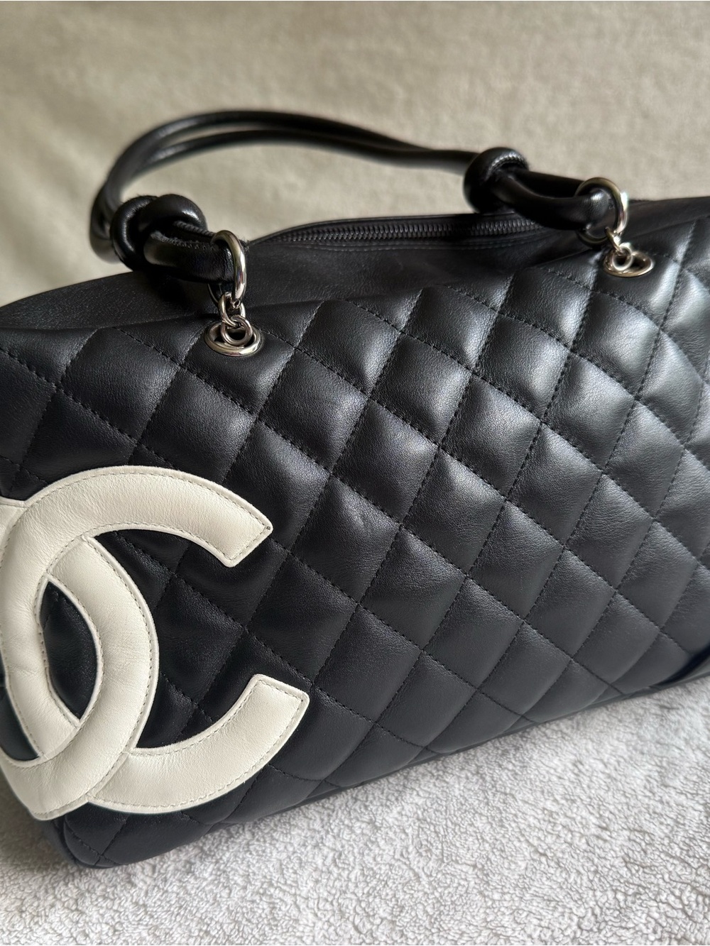 CHANEL Black Quilted Leather Shoulder Bag with White CC Logo